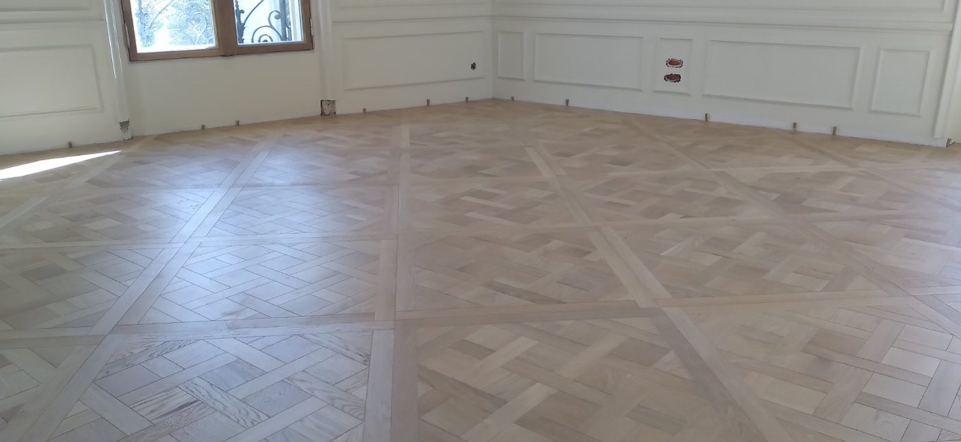 Parquet Versailles salon haussmannien Paris — pose traditionnelle chêne